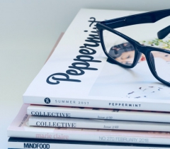 photo-of-eyeglasses-on-top-of-magazines-1007027